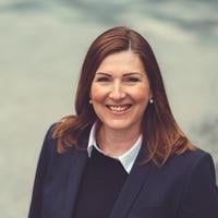Woman Smiling - CEO Anne Gretland